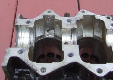 http://www.leeroysramblings.com/OB%20images/9.9%20crankcase%20damage.JPG